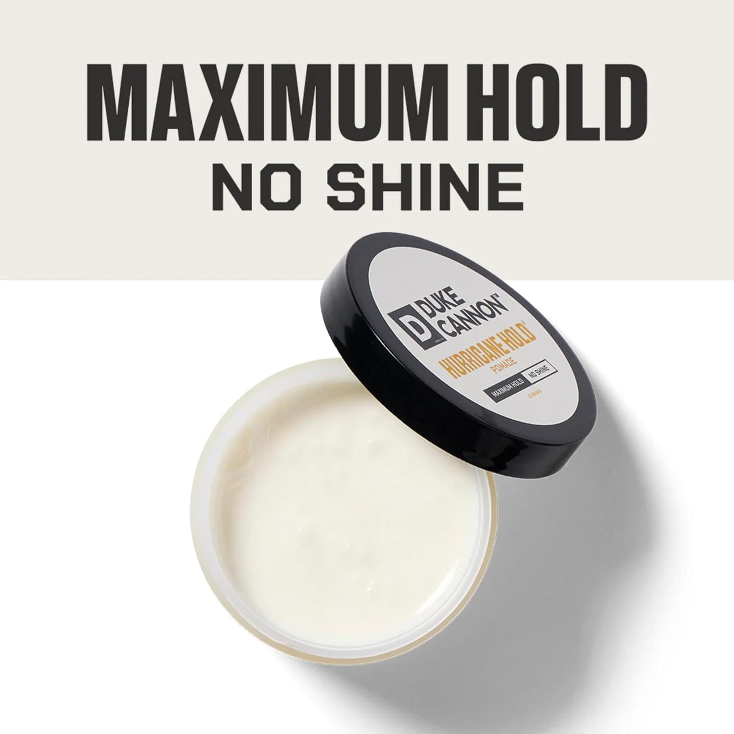 Hands apply Duke Cannon pomade for lasting hold.