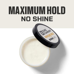 Hands apply Duke Cannon pomade for lasting hold.