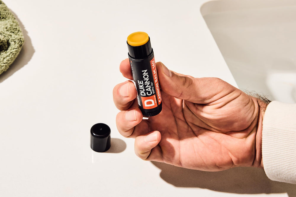 Duke Cannon Lip Balm cruelty-free with blood orange aroma.