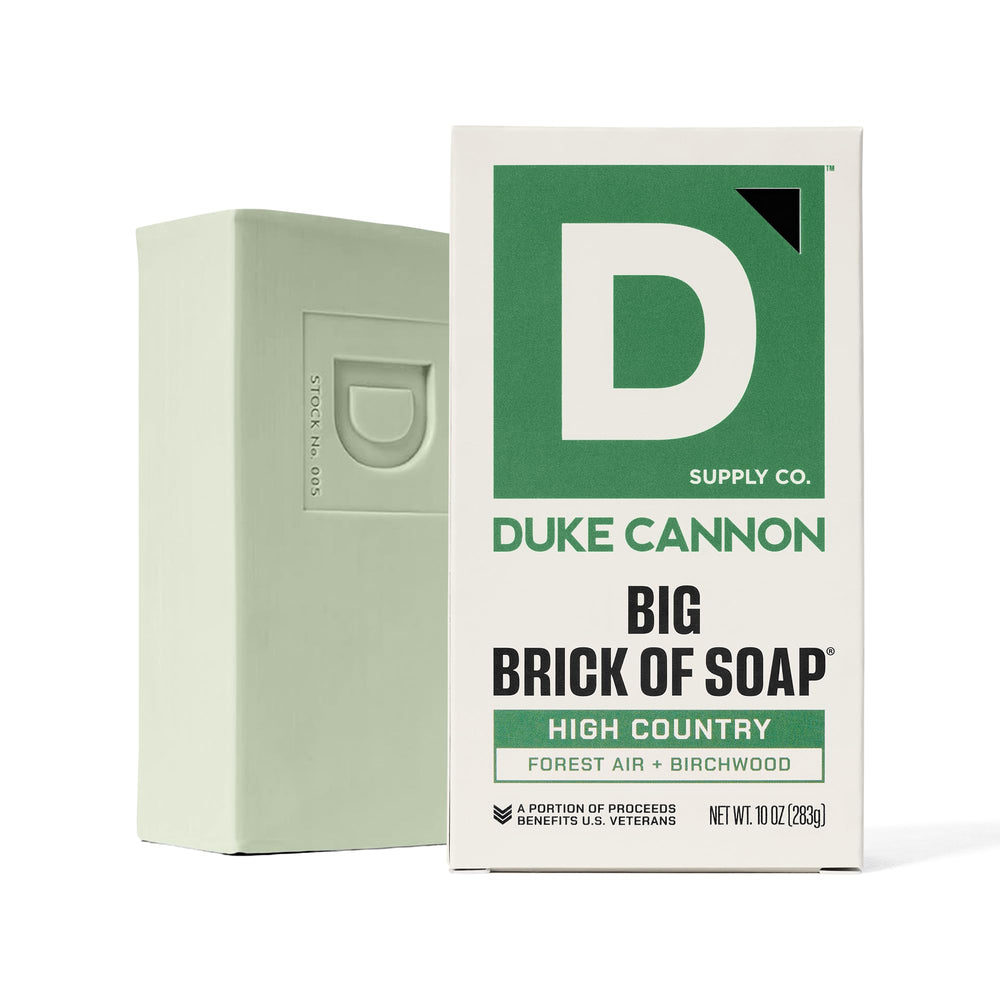 Duke Cannon rugged-male grooming bar in use during shower.