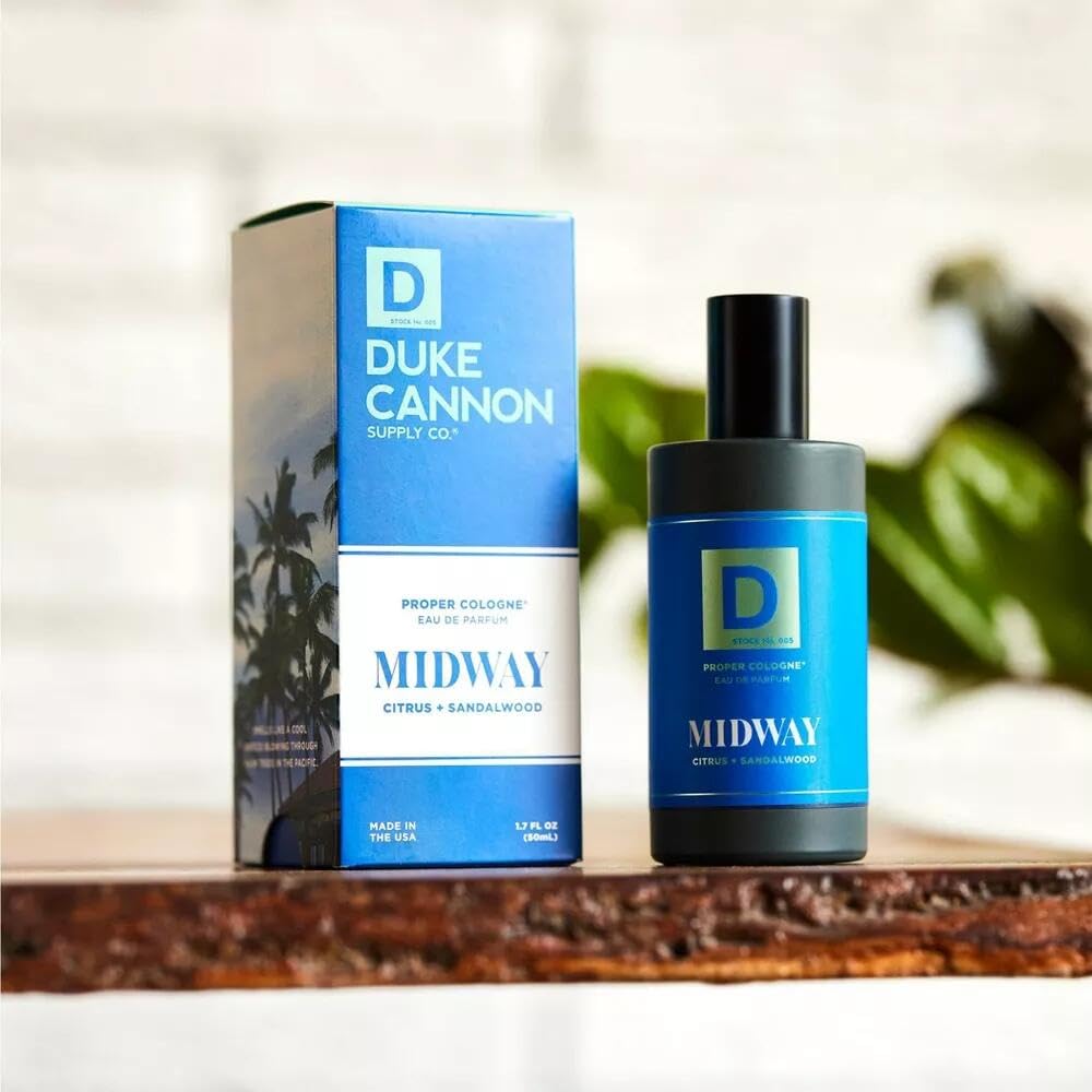 Duke Cannon Proper Cologne Midway bottle on a woodgrain backdrop.