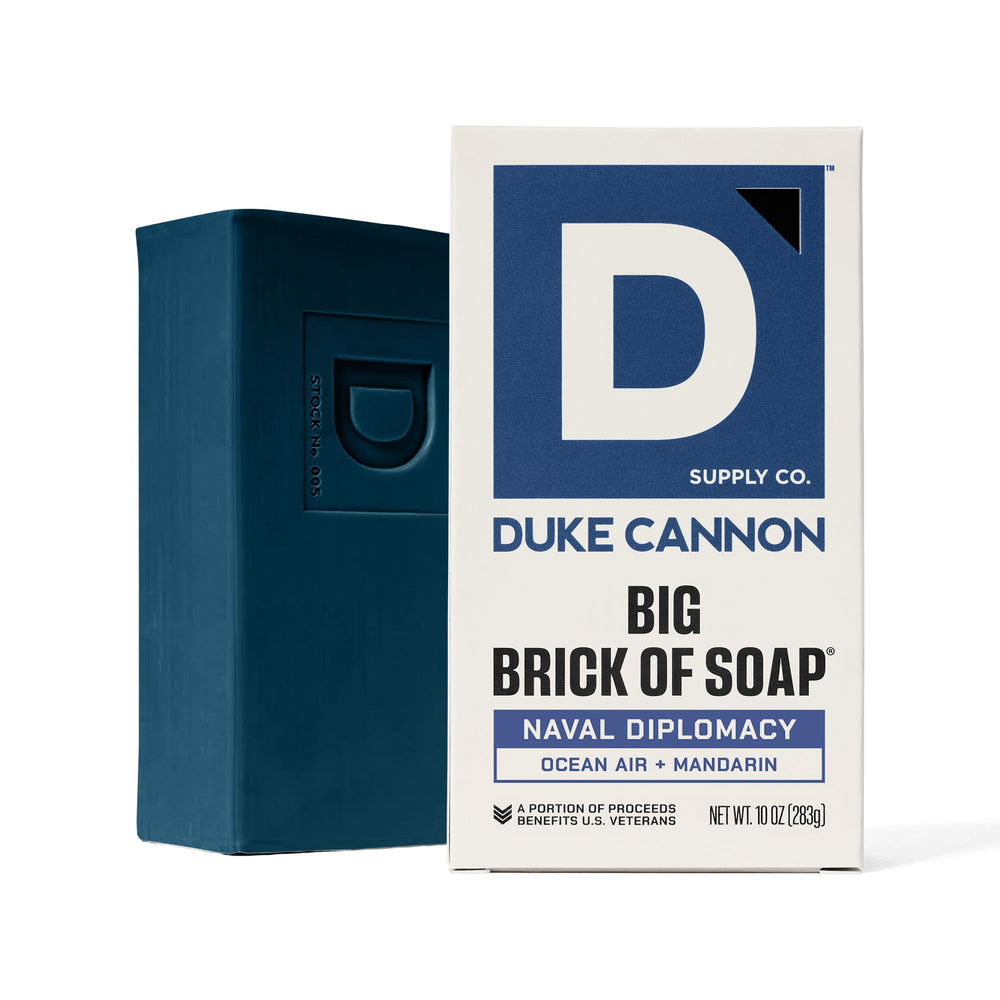 Duke Cannon rich lather shown with loofah for thorough cleanse.