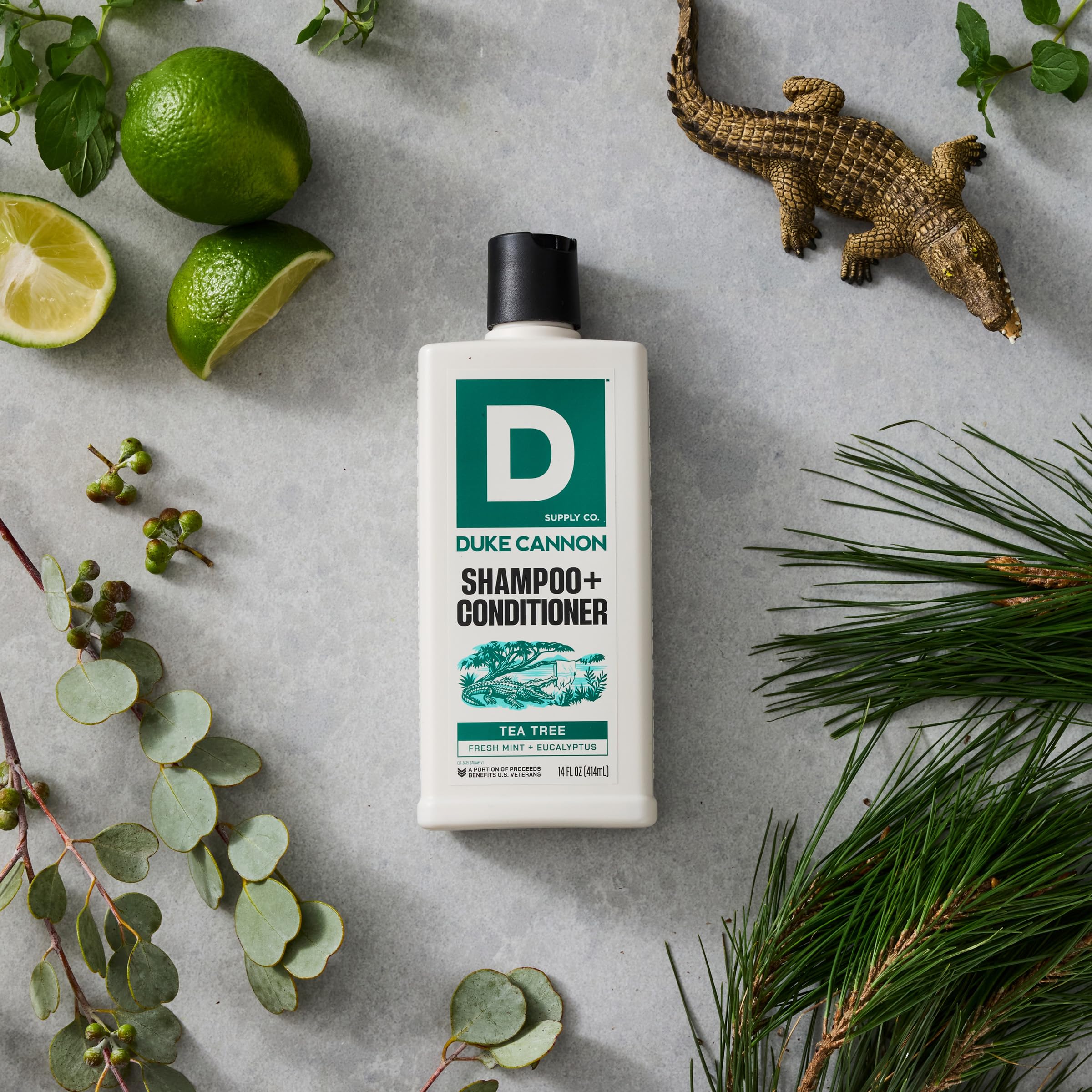 Duke Cannon Tea Tree 2-in-1 foamy lather in a shower.