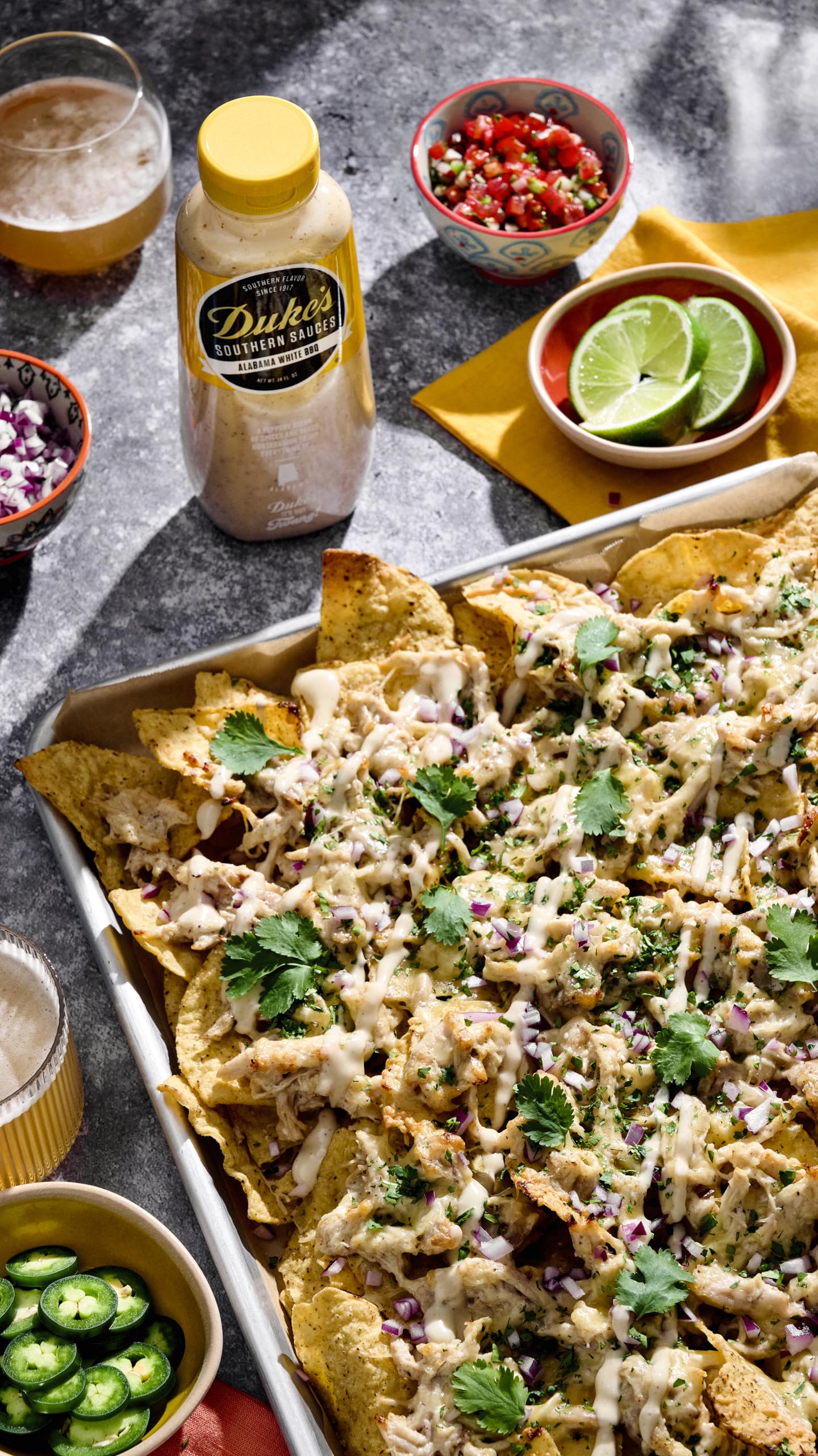 Duke’s Alabama White Sauce on smoked meats adds Southern smoke and zing.
