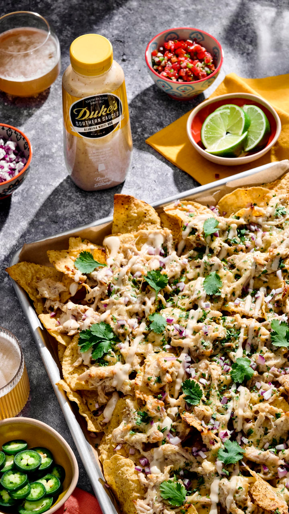 Duke’s Alabama White Sauce on smoked meats adds Southern smoke and zing.