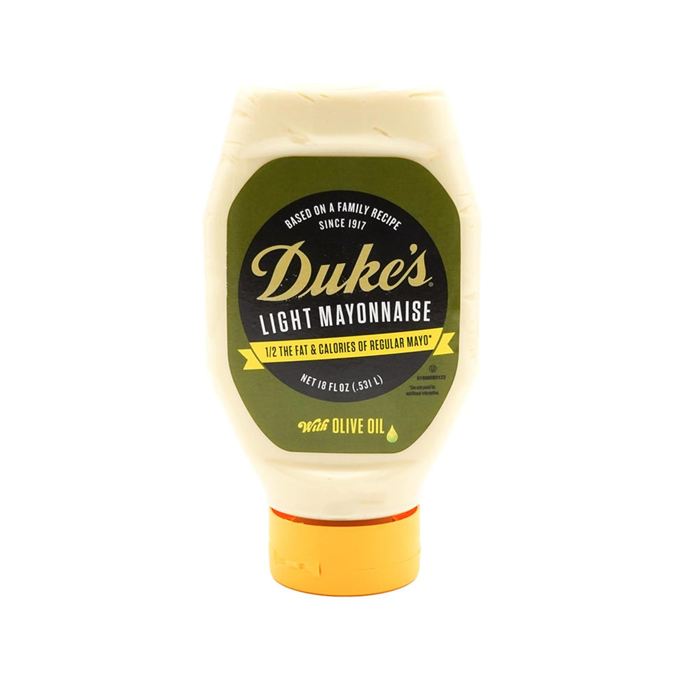 Duke’s Light Mayonnaise with Olive Oil Blend bottle pour for creamy dressings and sandwiches.
