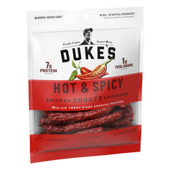Duke's Shorty Sausages ingredients close-up with fresh pork and peppers visible.