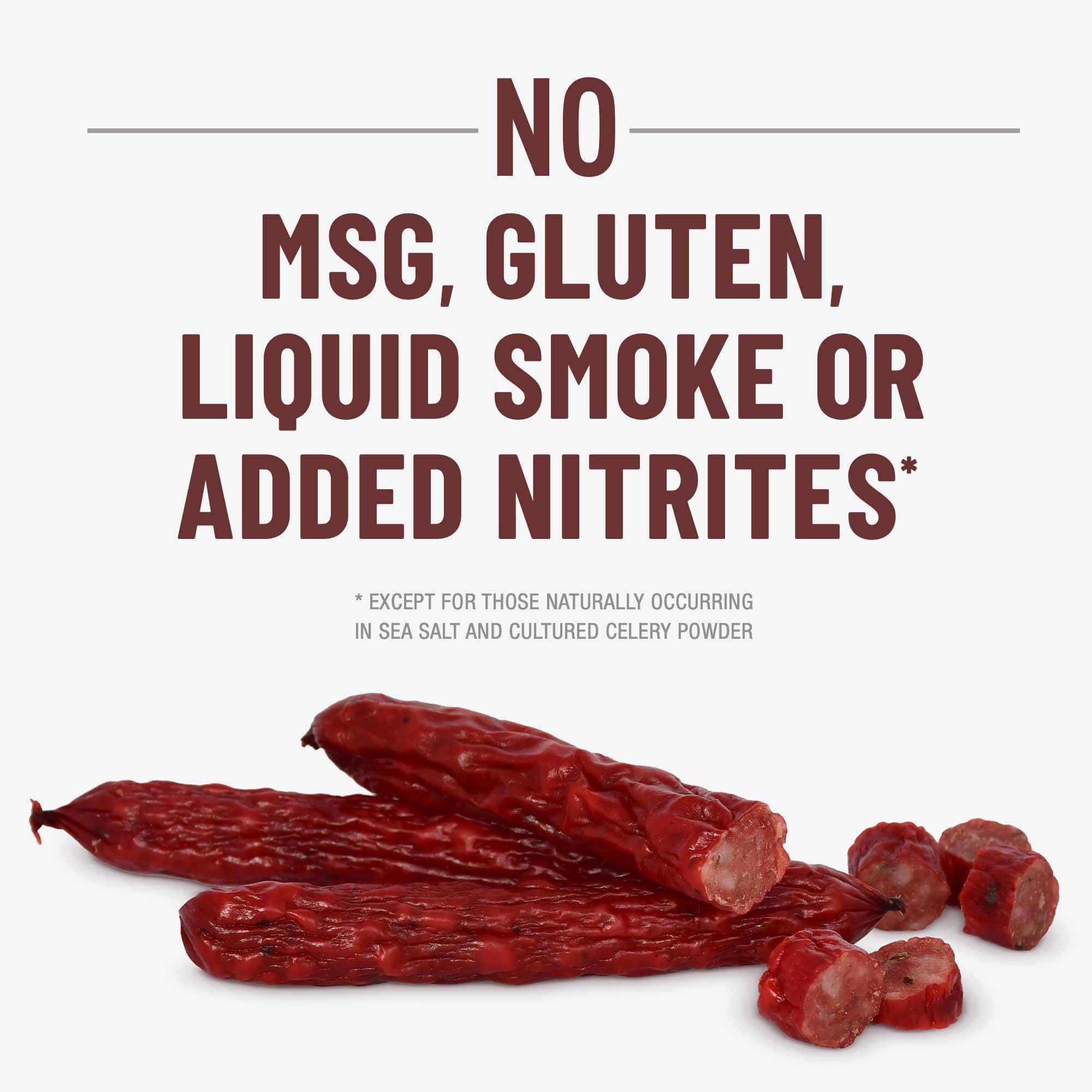 Duke's sausages in skillet show a savory, gluten-free snack option.
