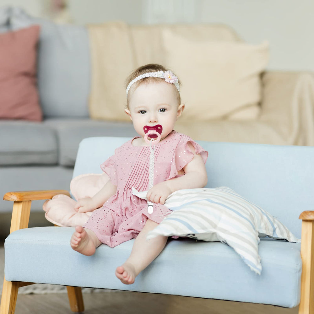 Duludulu baby clip-on teether holder helps prevent pacifier loss during play.