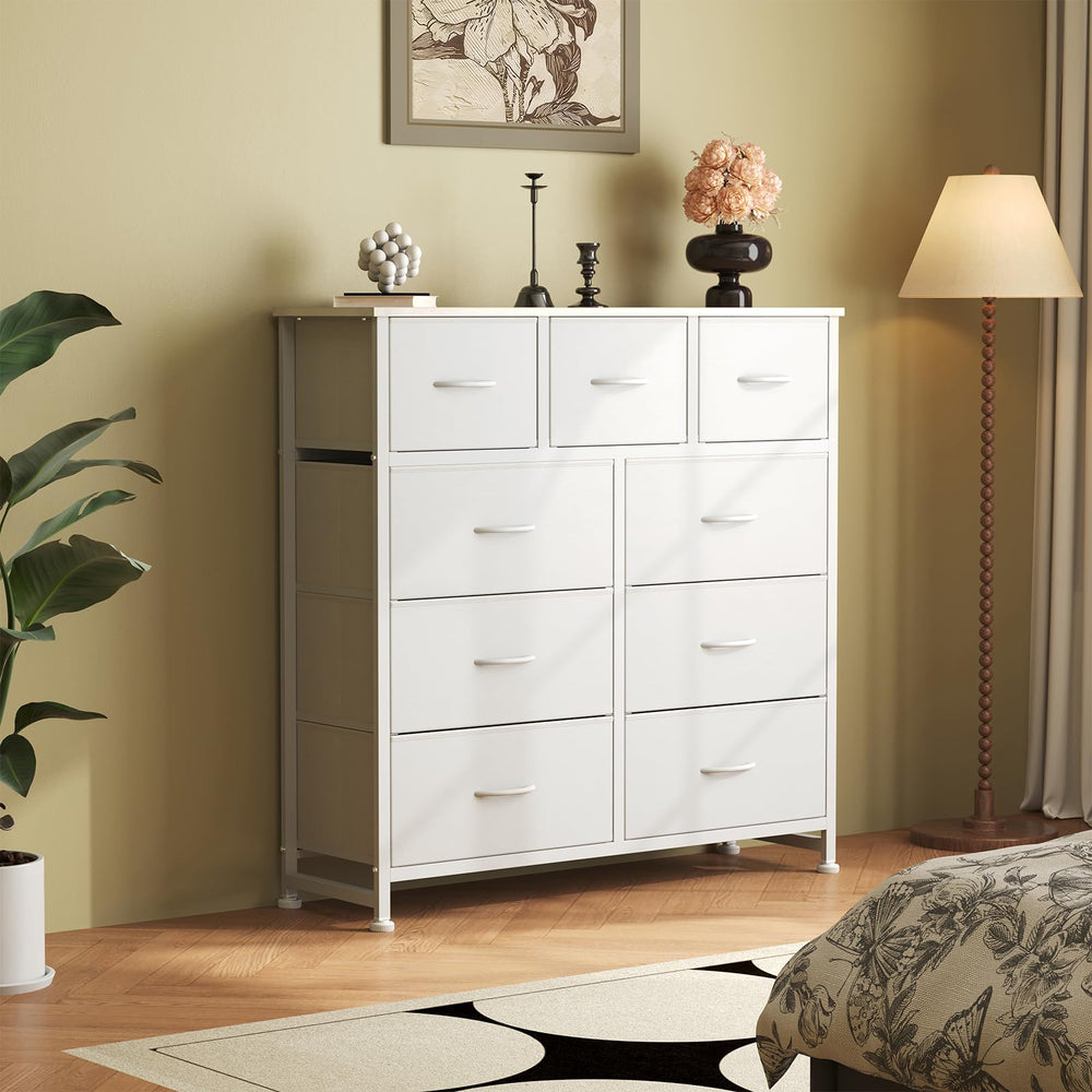 DUMOS dresser fabric bins in drawers ideal for clothing organization.