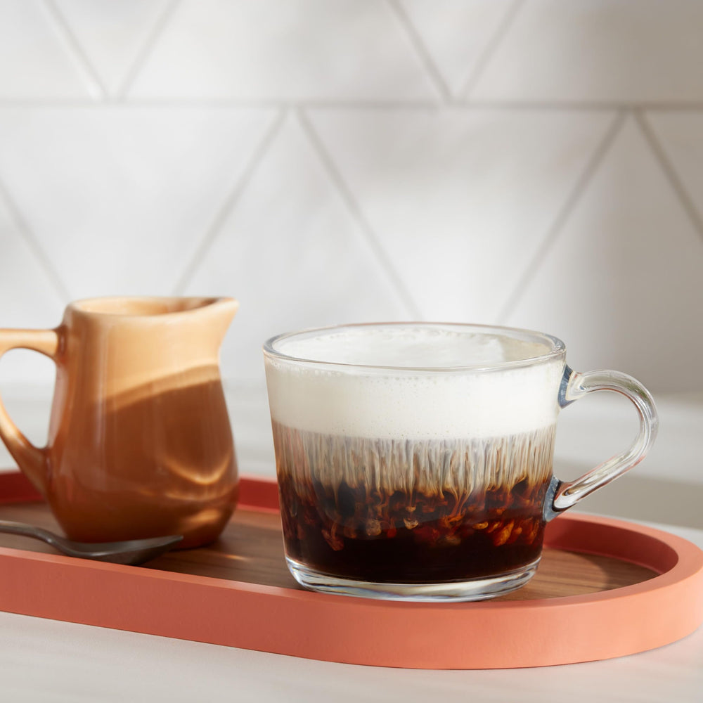 Dunkin decaf boxes stacked show four-pack convenience for households.