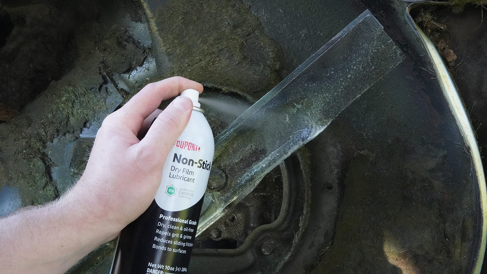 DuPont Non-Stick spray on a kitchen hinge for easier movement and reduced sticking.