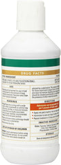 Durvet WormEze liquid bottle pour demonstrates convenient dosing into water or food.