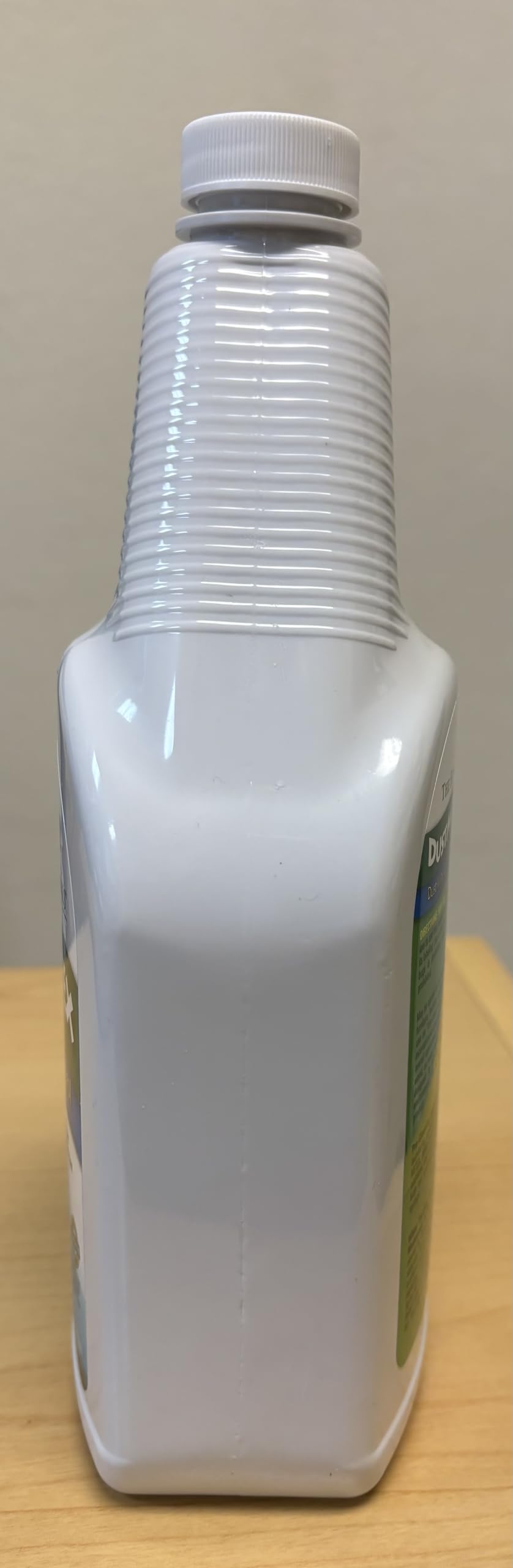 DustmiteX coverage per spray shown for treating up to 100 sq ft.