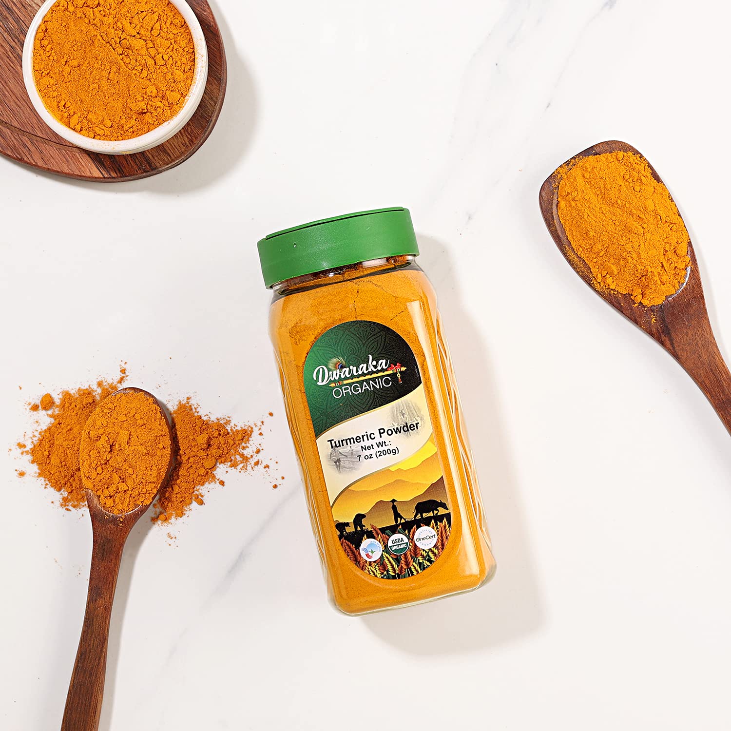 DWARAKA turmeric powder on spice shelf signals a versatile pantry staple for cooking.