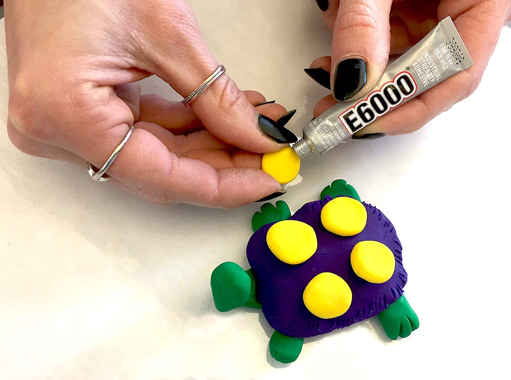 E6000 paintable adhesive demonstrating versatile finishing on fabric or wood.