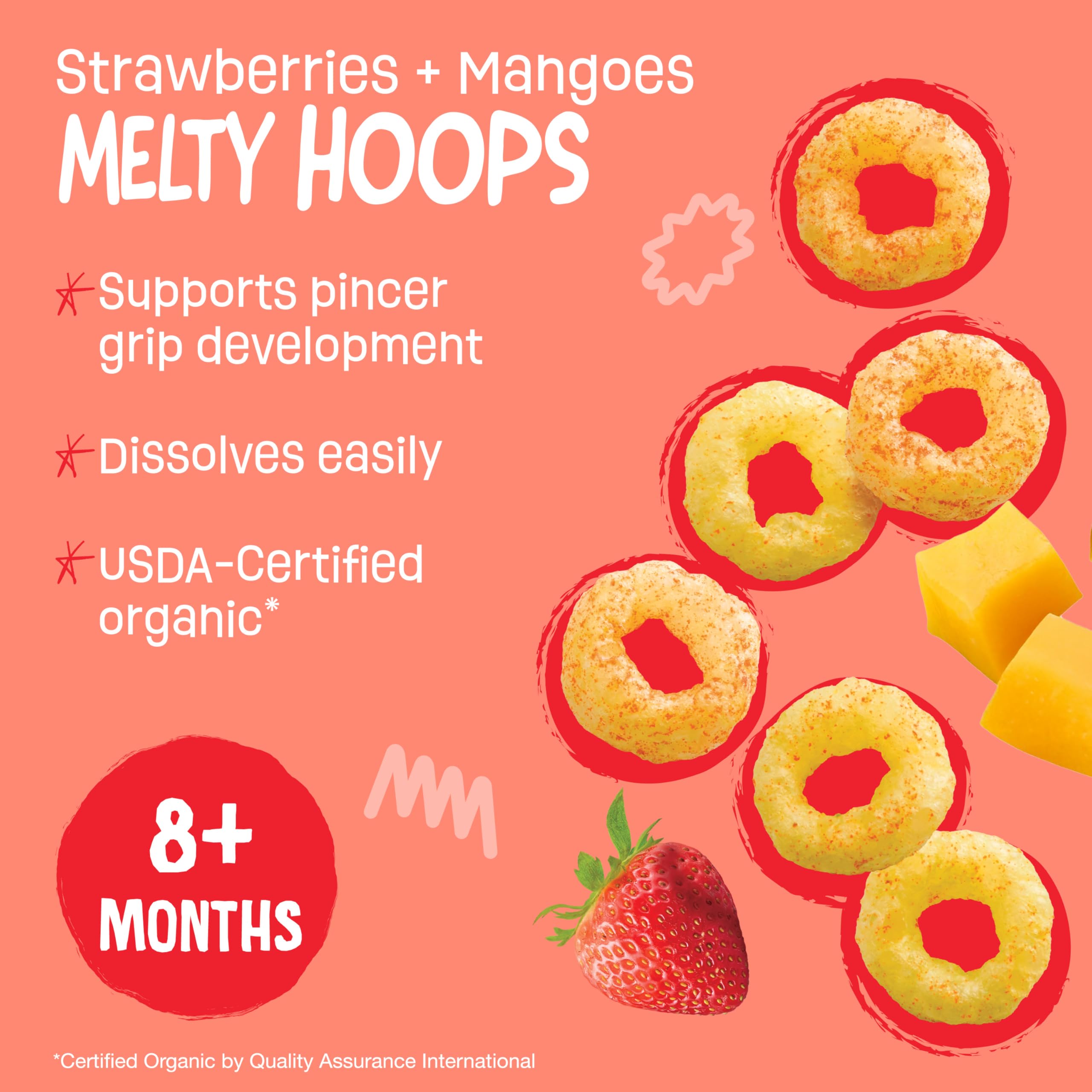 Tiny hand reaches for Melty Hoops ring to develop pincer grip.