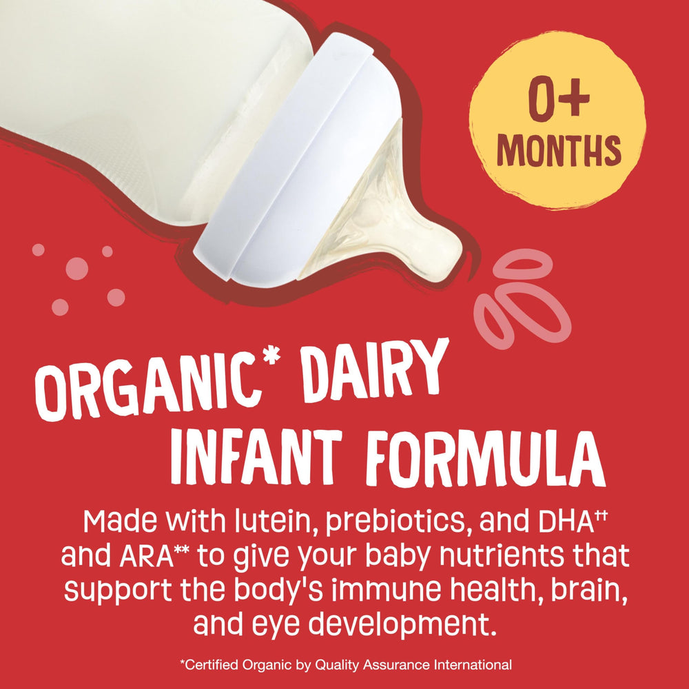 Pouring Earth's Best Organic Baby Formula into a bottle