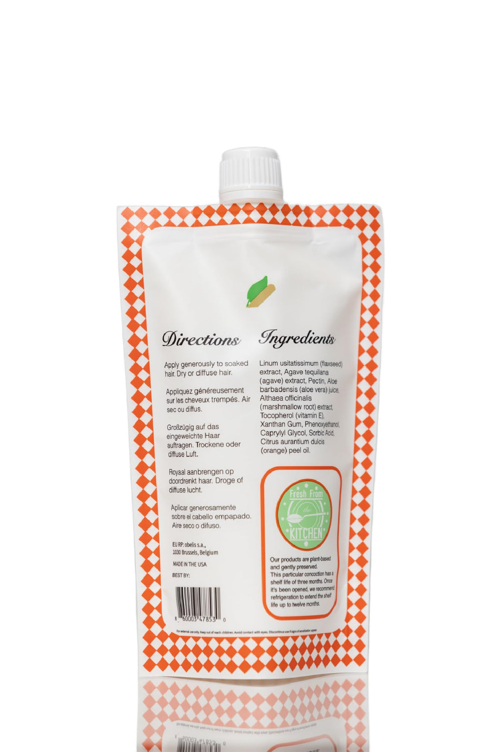Ecoslay Orange Marmalade applying on waves demonstrates lightweight styling in action