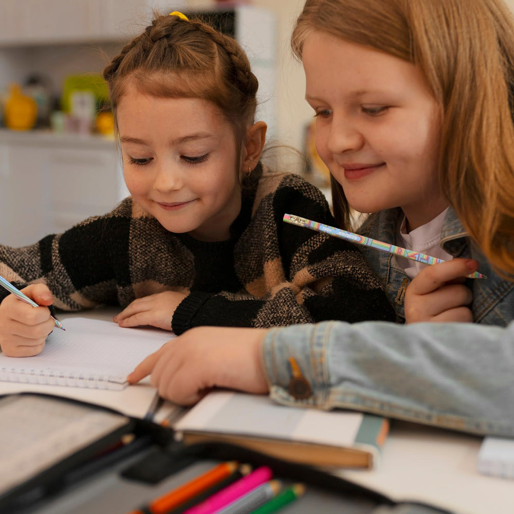 Kids using ECOTREE pencils for homework with colorful, reliable performance.