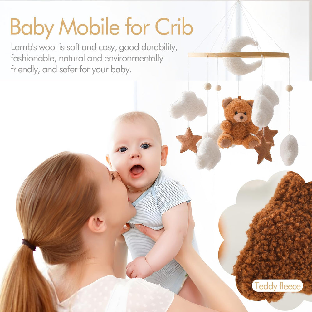 EERKEOD baby with mobile enjoys gentle bells and movement.
