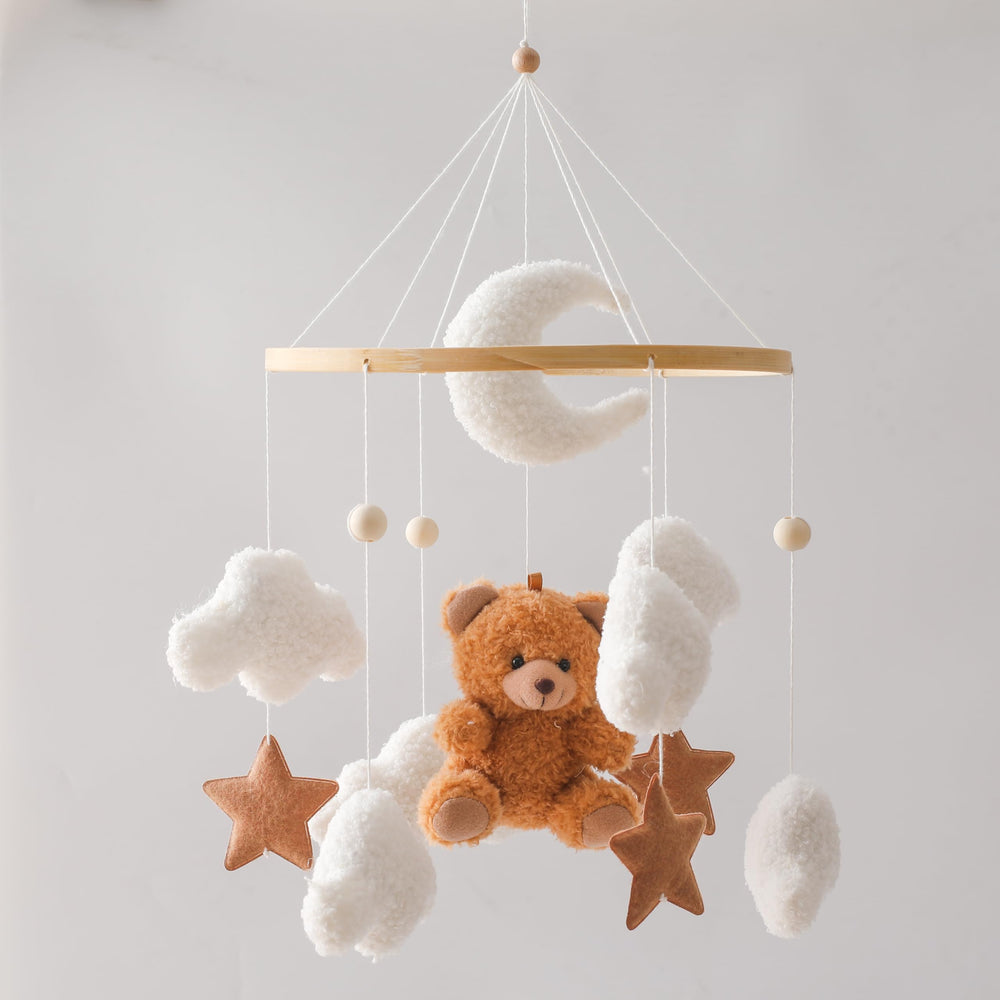 EERKEOD bear-mobile cradle setup shows soothing nursery decor and safe visual stimulation.