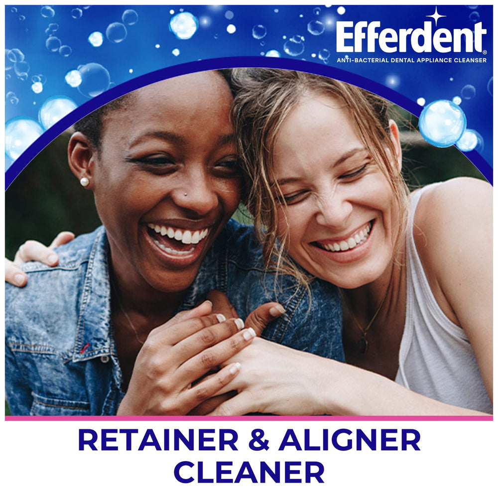 Efferdent cleaning tablet beside a retainer or aligner case.