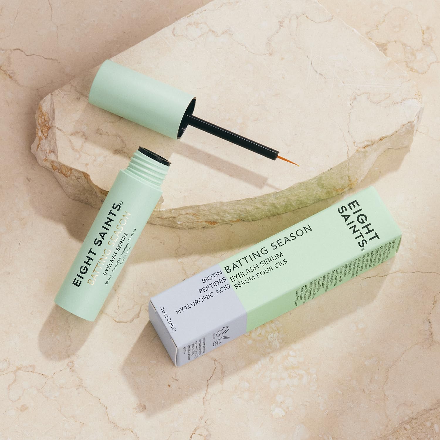 Eight Saints Batting Season serum application near the eye demonstrates easy-to-use formula.