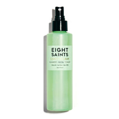 Eight Saints Coast is Clear bottle on bathroom counter for pore care.