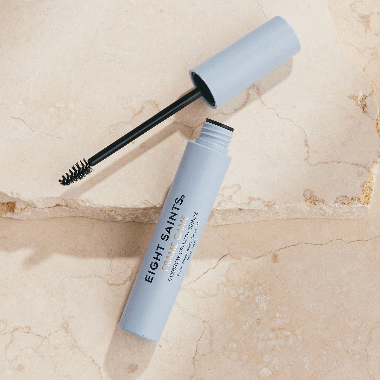 Eight Saints Frame Game serum drop detail shows precise dosage for controlled application