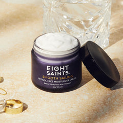 Eight Saints retinol cream on neck area for targeted care.