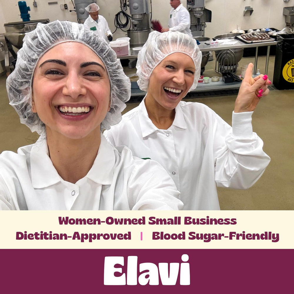 Serving suggestion of ELAVI Protein Brownie plated with a glass of plant milk
