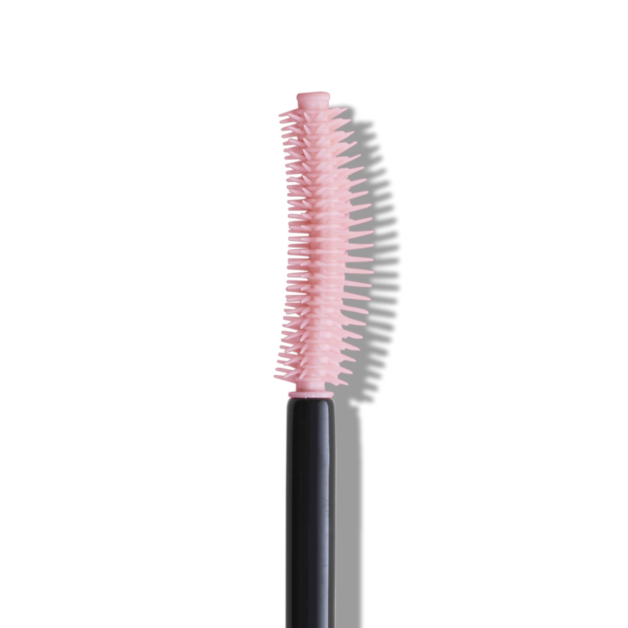e.l.f. Lash 'N Roll close-up shows curved silicone bristles for precise application and lift.
