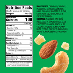 Emerald cashews and almonds with dried pineapple close-up showing crunchy texture