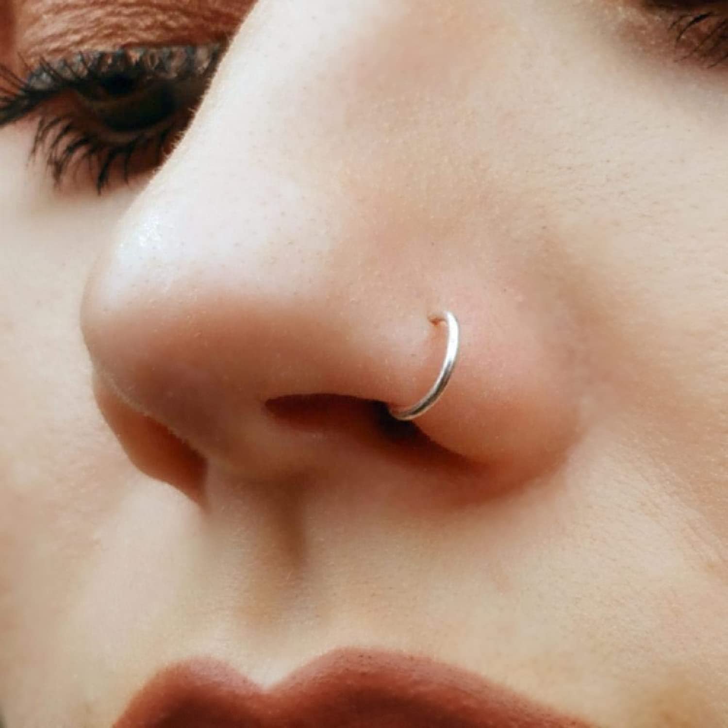 EnCharmed clip-on nose ring rose gold filled, close-up with soft blush sheen.