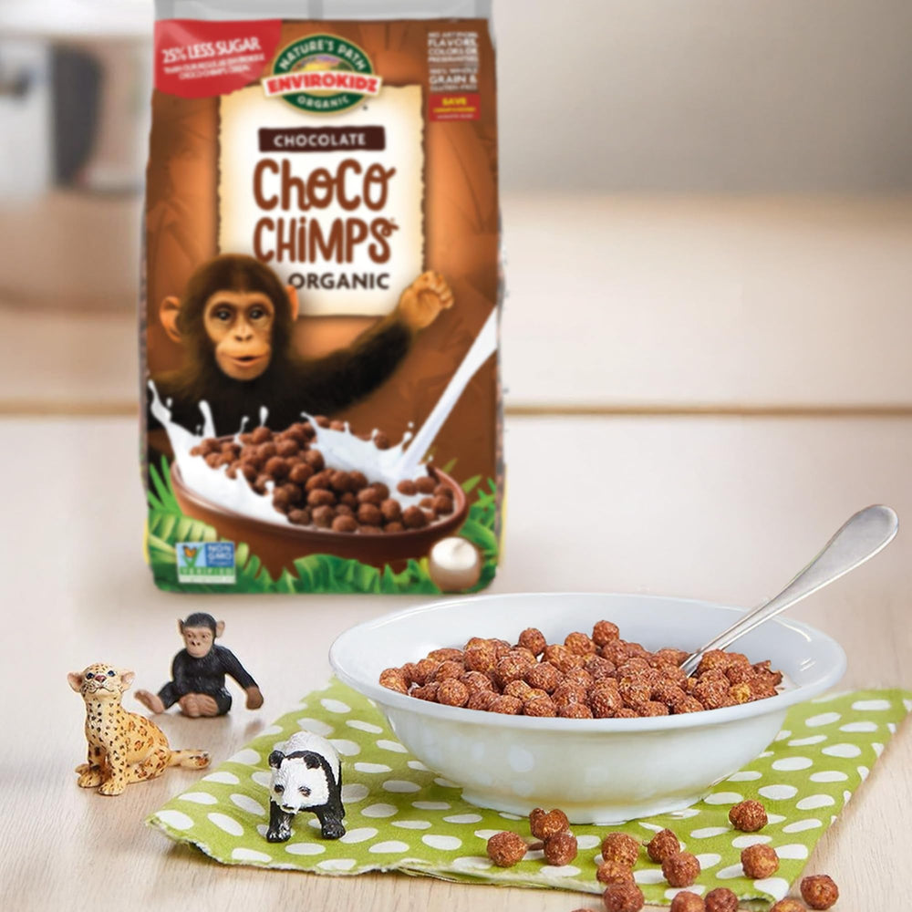 Spoon pouring EnviroKidz Choco Chimps for a quick breakfast.