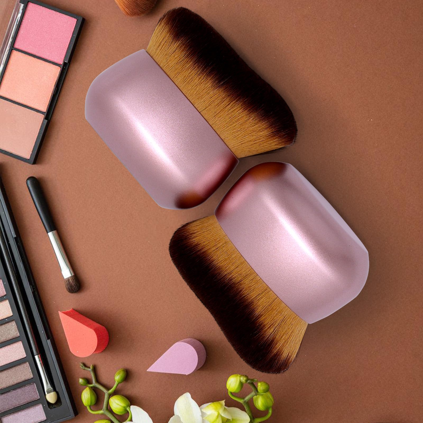 EOICCEOH pink rose-gold handle enhances grip while blending leg makeup.