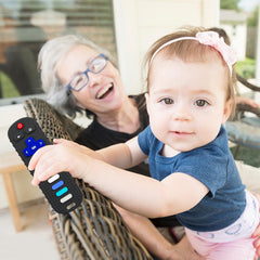 ERSIHUA TV remote teether closeup shows textured buttons for sensory exploration.