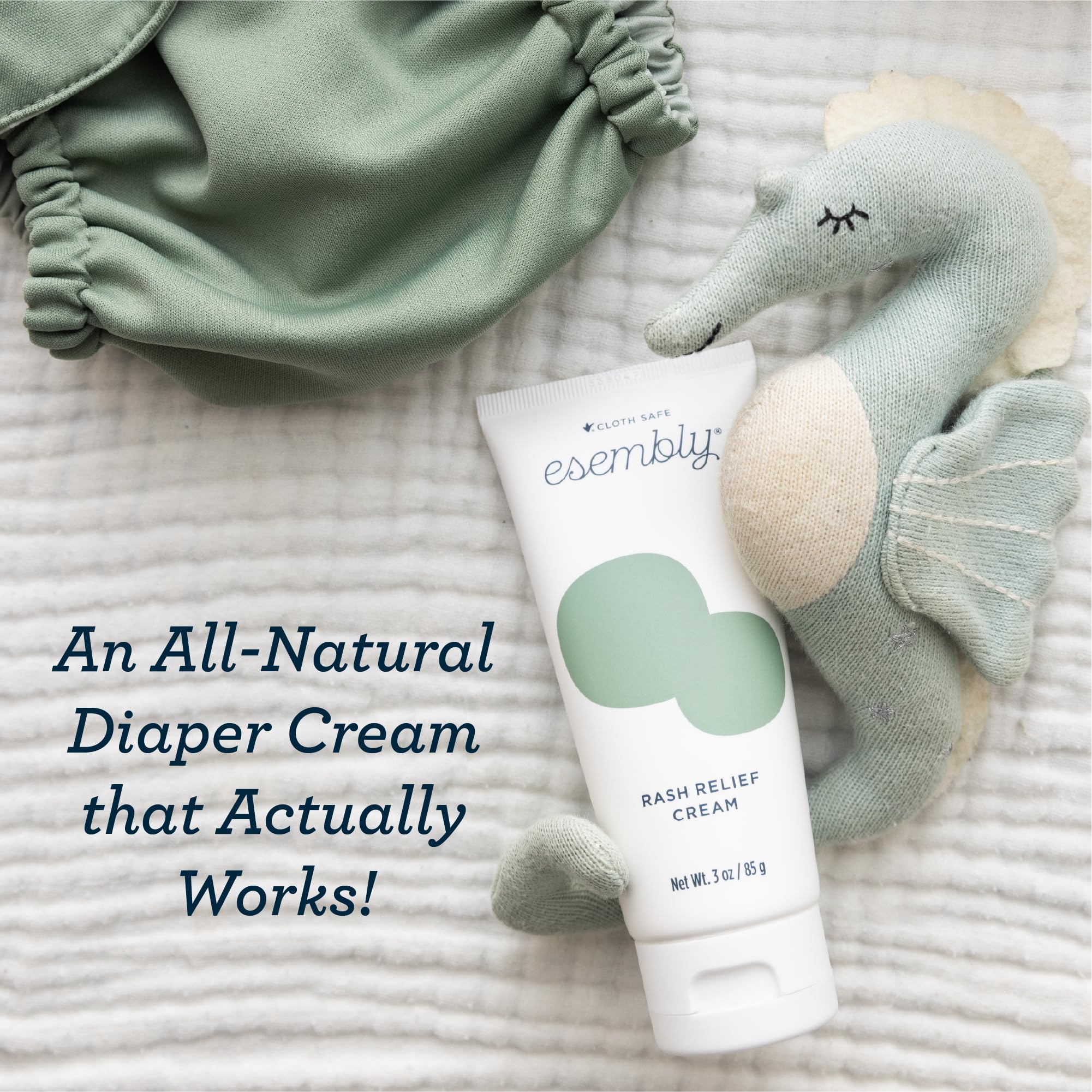 Application demonstration after diaper change supports ongoing comfort for baby.