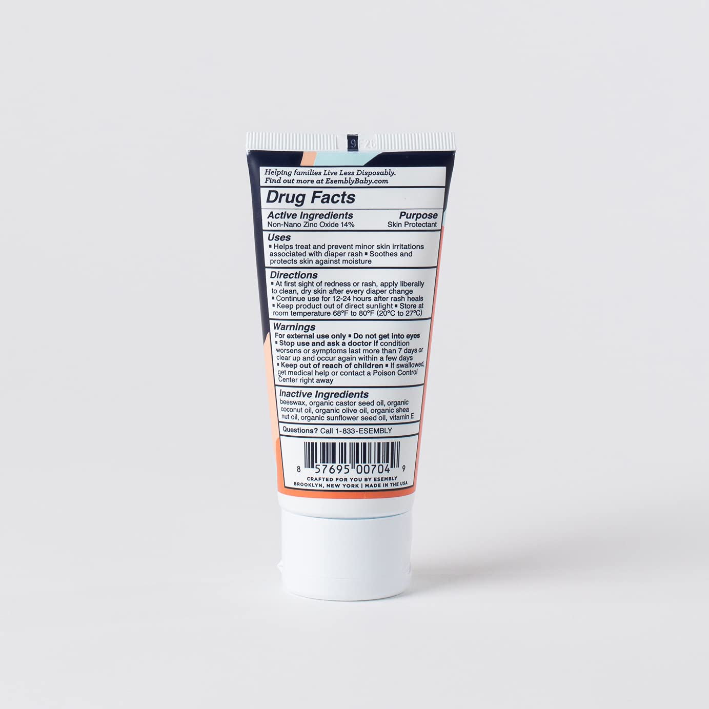 Product label emphasizes organic oils and zinc oxide active ingredient.
