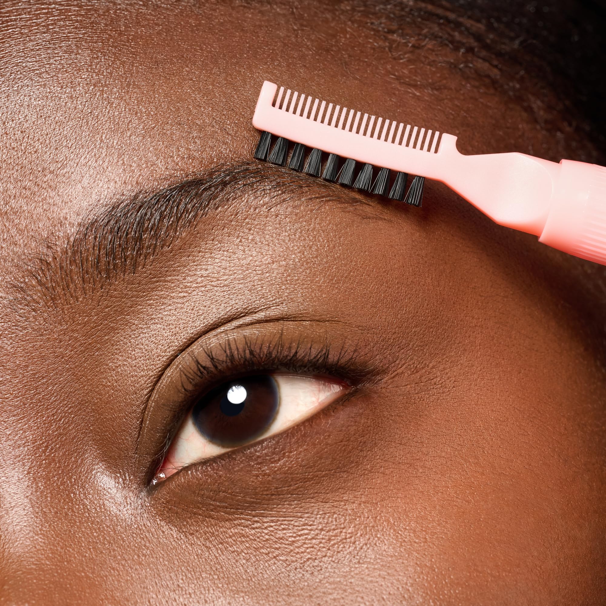 essence Brow Lift Glue no-flake-formula keeps brows tidy without irritation.
