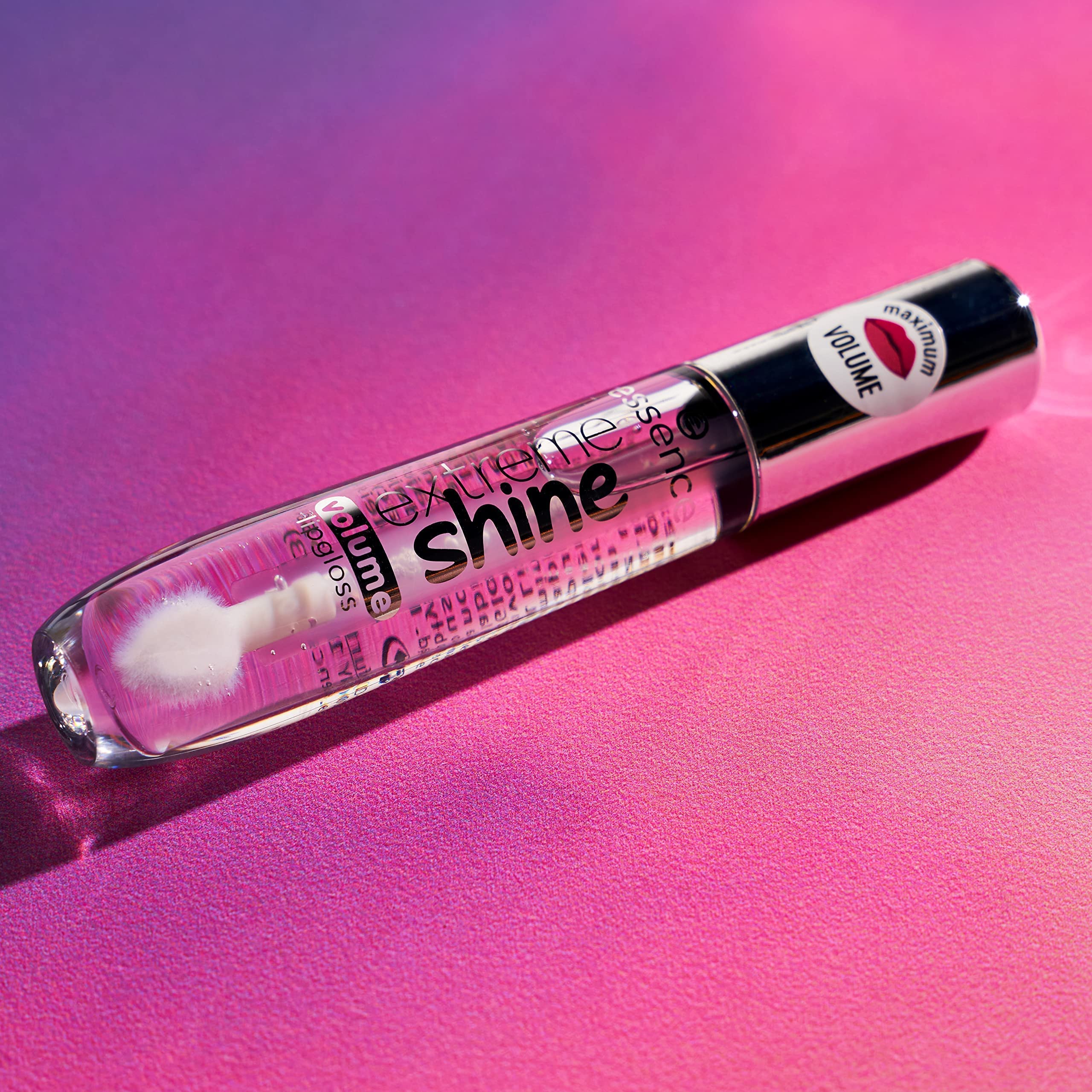 essence Extreme Shine Volume Lip Gloss on lips delivers high shine without heaviness.