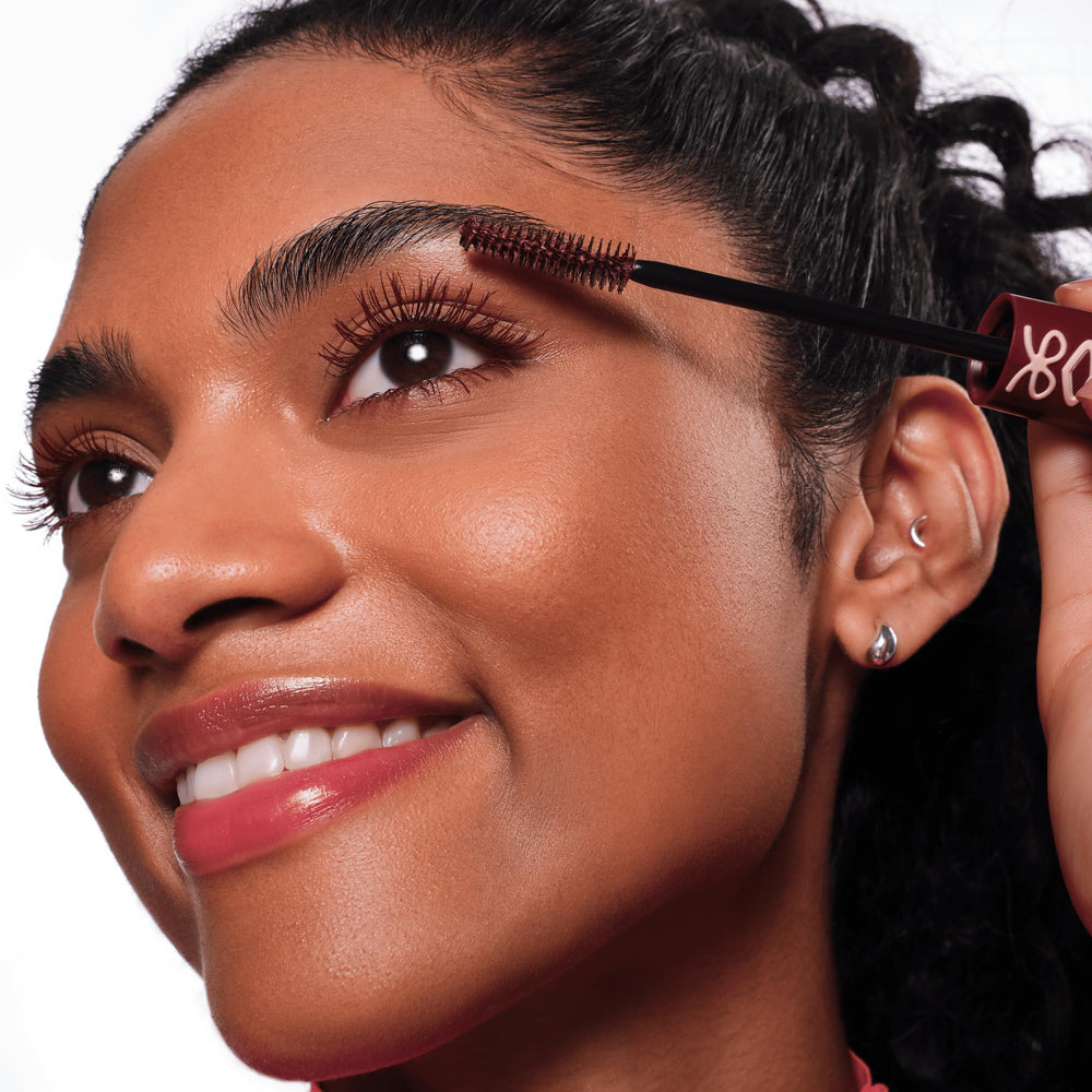 essence Lash Princess Burgundy color swatch near eye