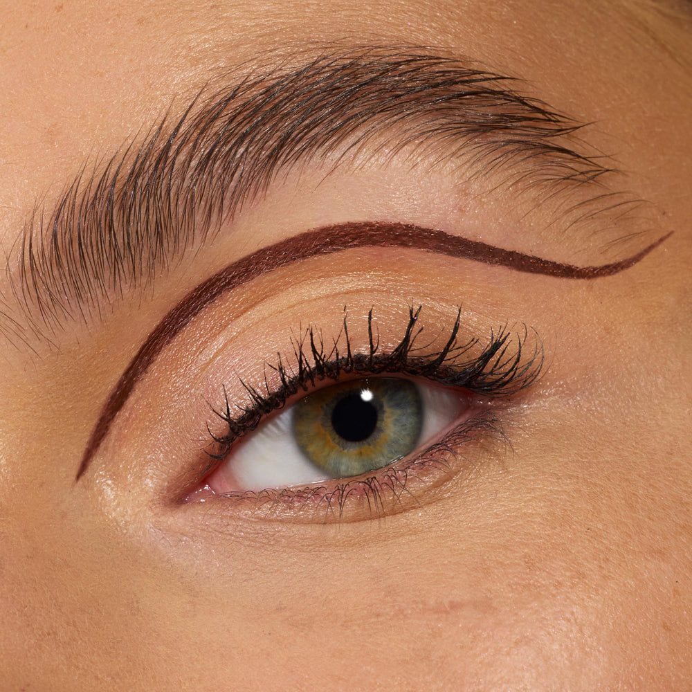 essence Lash Princess Liner Brown color payoff in a bold stroke.