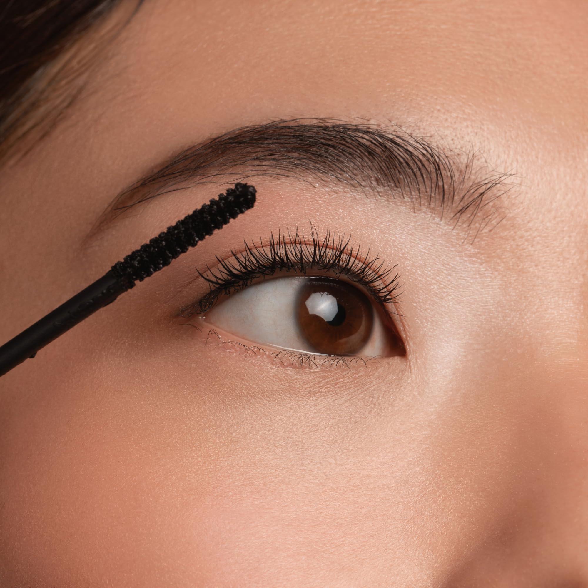 essence Lash Princess Slim Brush closeup of slim fiber wand in use