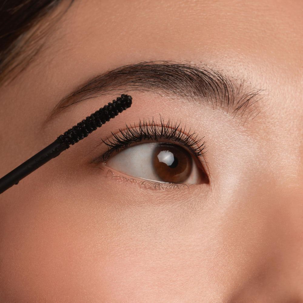 essence Lash Princess Slim Brush closeup of slim fiber wand in use