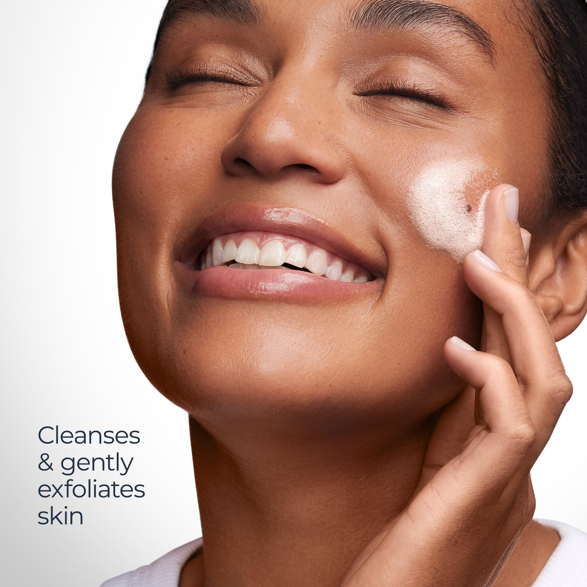 Rinsing off Eucerin Radiant Tone cleanser to reveal hydrated skin