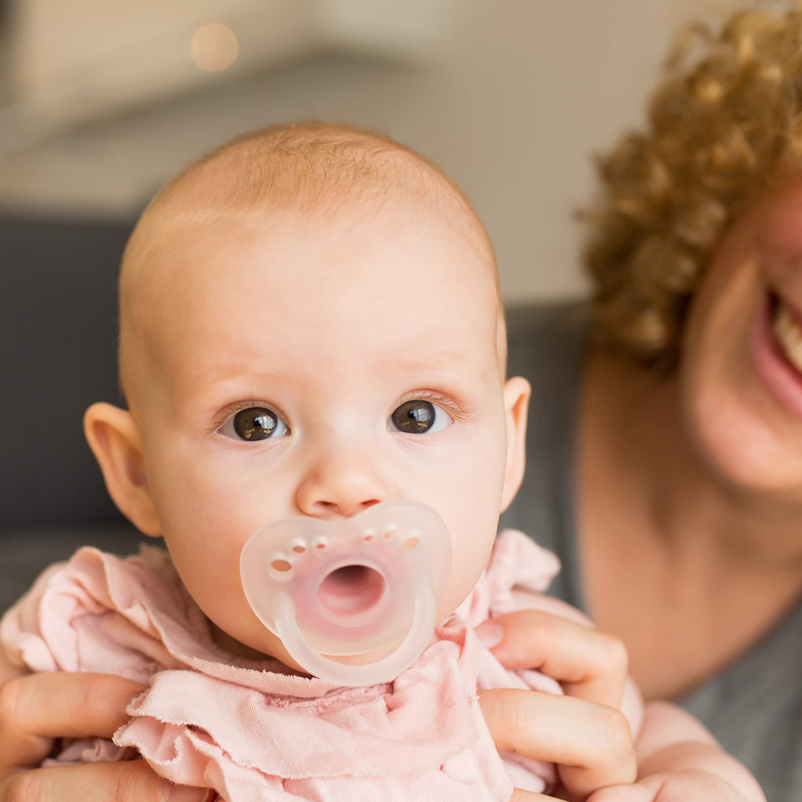 Evenflo Balance Plus pacifier with steam sanitization bag for quick cleaning.