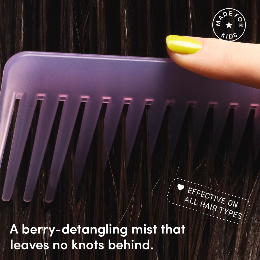 Evereden Kids Detangler Spray on brush aiding quick comb-through.