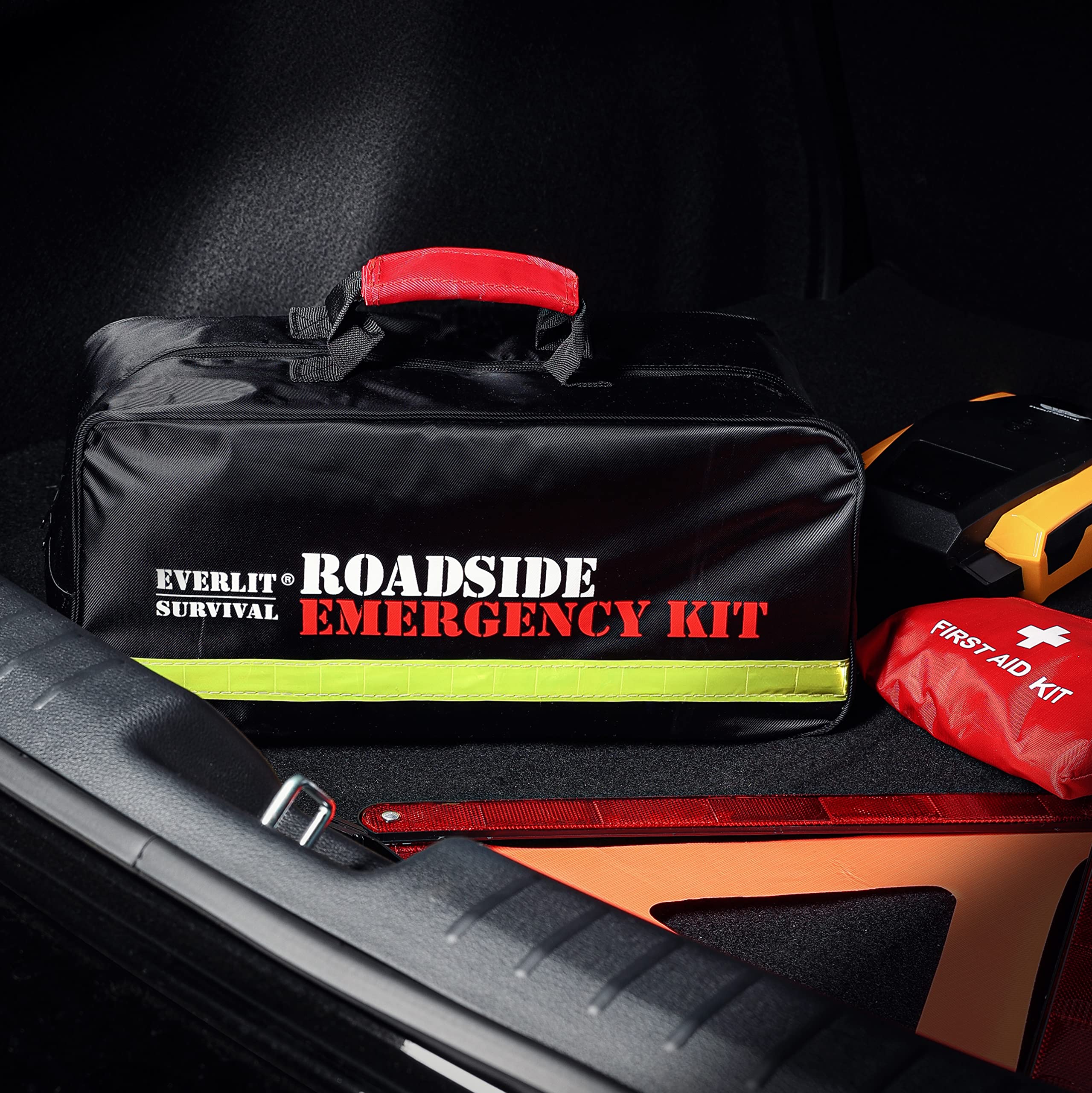 Everlit roadside poncho and reflective triangle for visibility and weather protection.